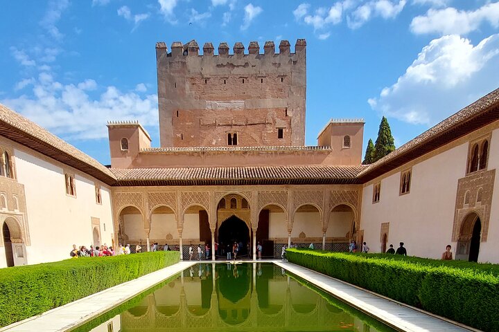 Comares Tower and its reflection in the Court of the Myrtles