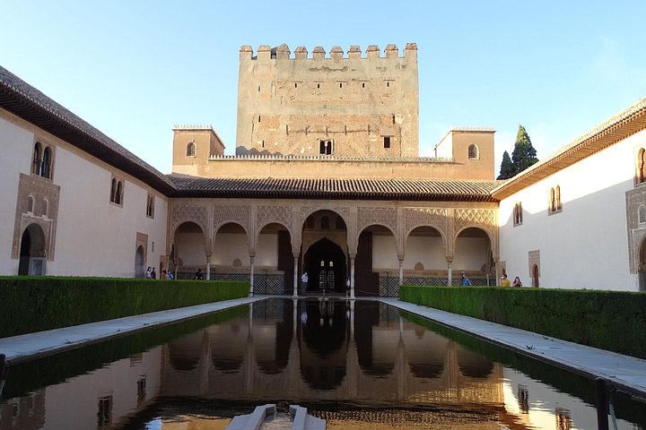 Comares Tower and arcades mirrored in the Court of the Myrtles pool